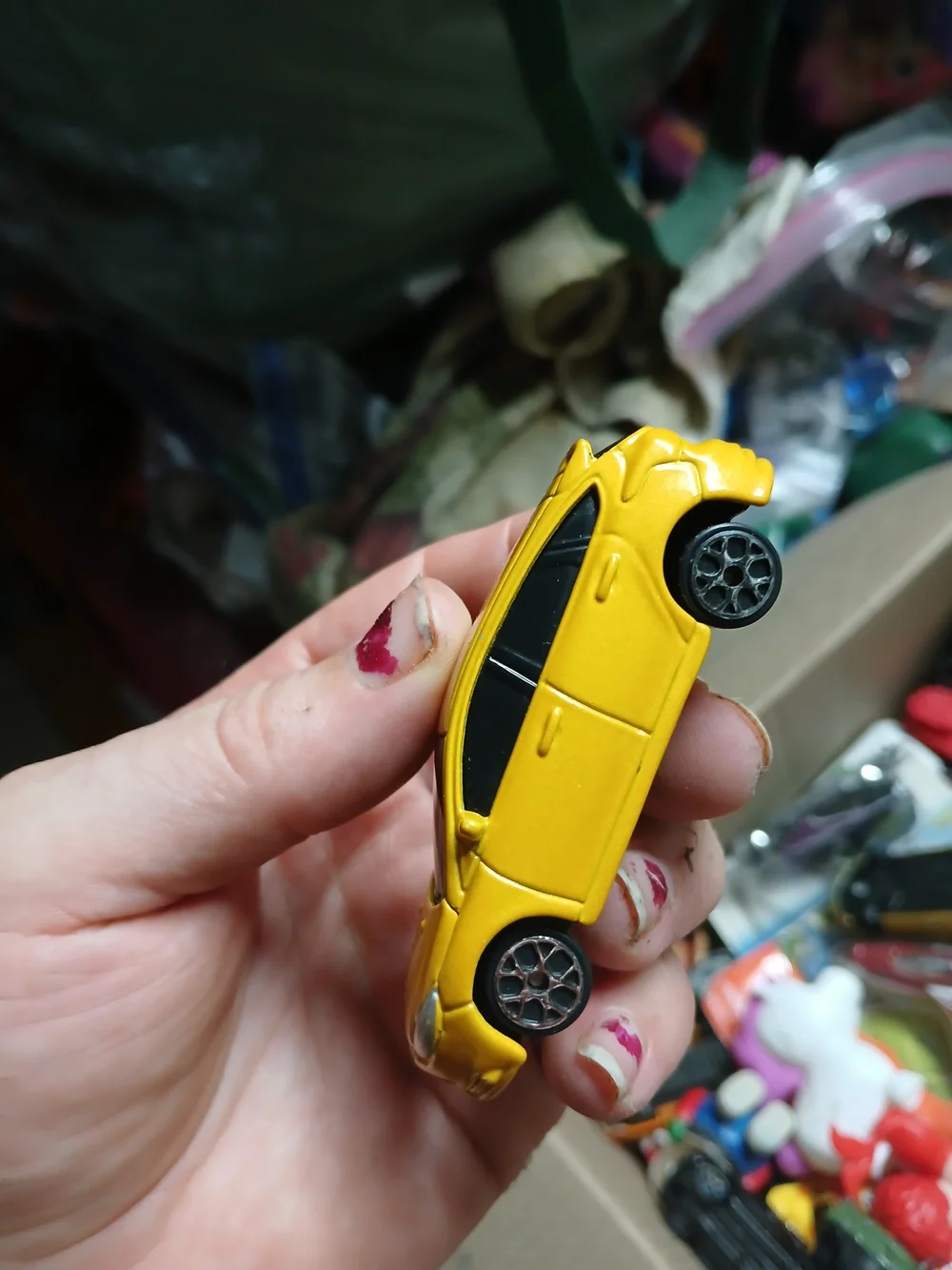 yellow 1:64 scale Maisto Ford Focus ST die-cast toy car